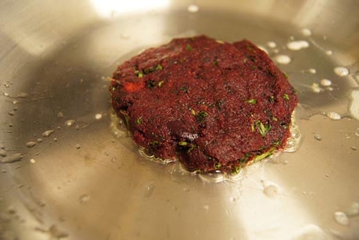 beet burger in frying pan 