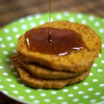 pancakes with syrup on green plate