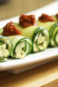 Cucumber roll ups with sun-dried tomato sauce