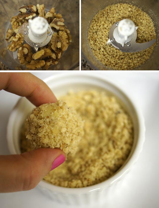 walnuts ground in a food processor and coating cheesecake ball in walnut mixture