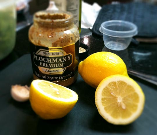jar of mustard and lemon halves