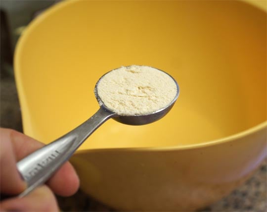 coconut flour in a measuring spoon