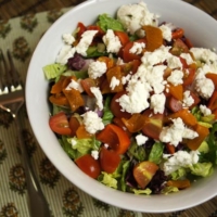 Salad with tomatoes peppers cheese and olives
