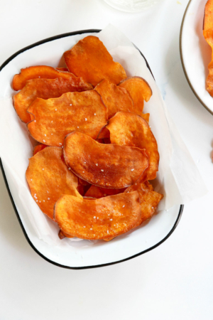 https://detoxinista.com/wp-content/uploads/2012/03/baked-sweet-potato-chips-in-basket-300x450.jpg
