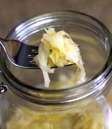 Raw sauerkraut on fork