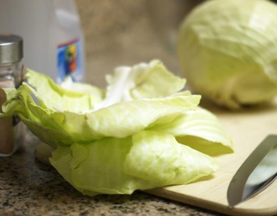 cabbage leaves on a cutting board
