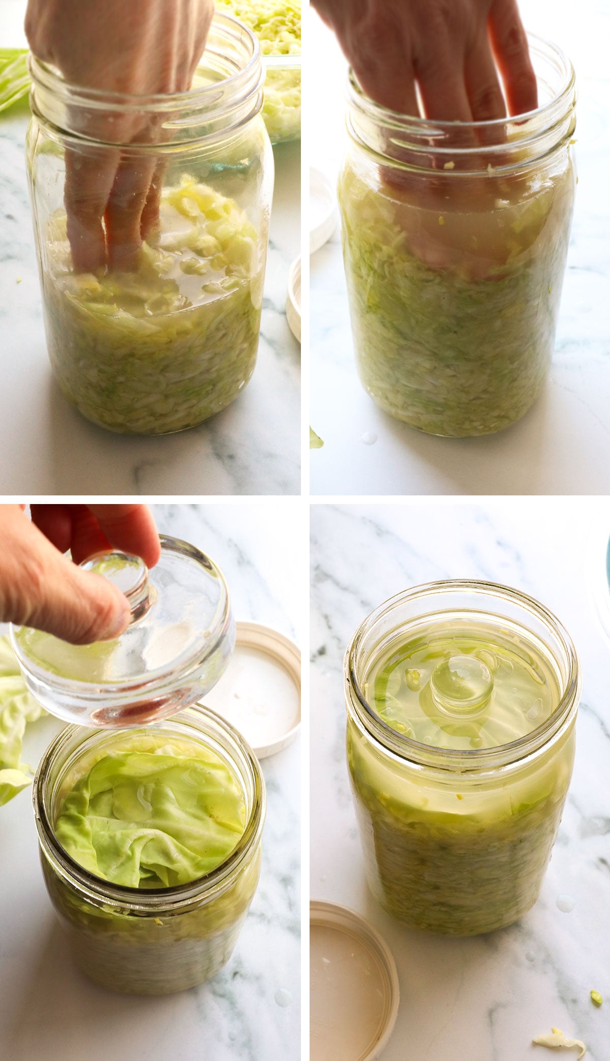 cabbage packed into a mason jar to ferment into sauerkraut.