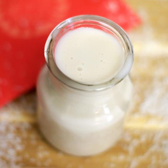 sweetened condensed coconut milk in a glass