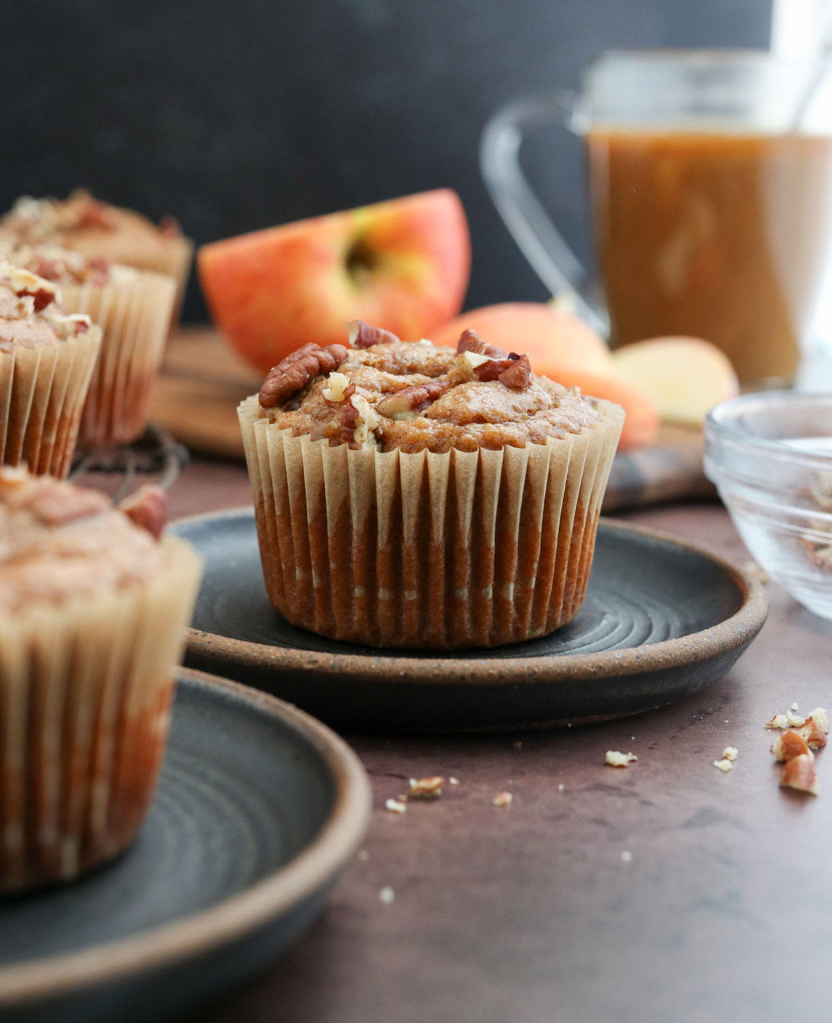 apple spice muffin on black plate