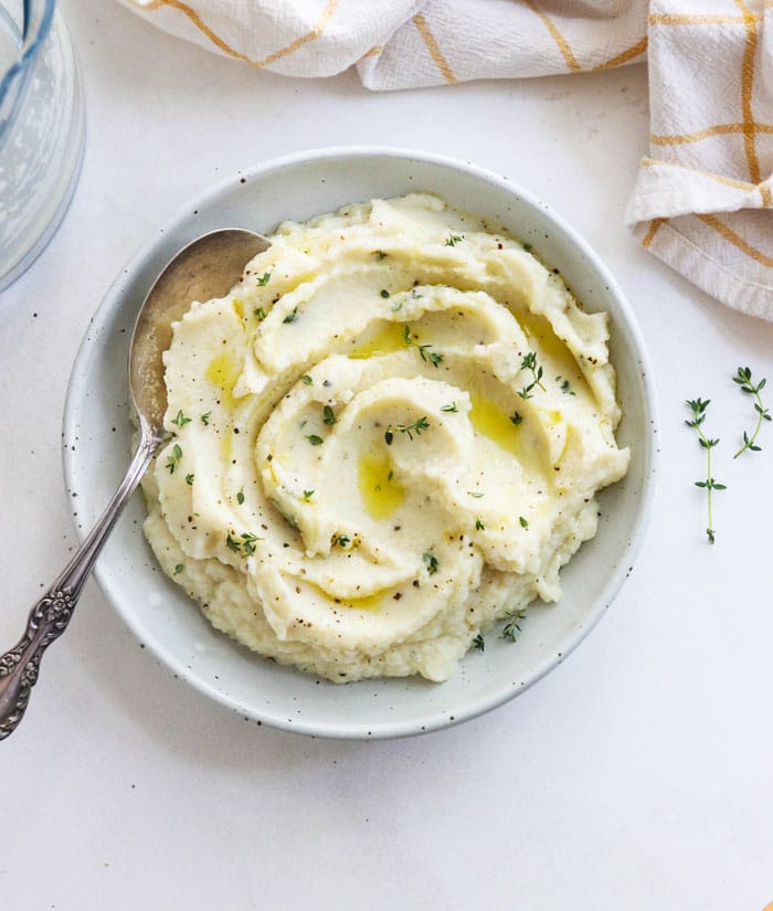 cauliflower mashed potatoes in a white bowl