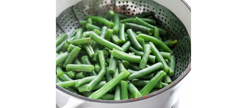 green beans cooking in pot
