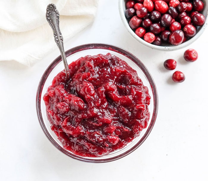 cranberry sauce recipe overhead with fresh cranberries