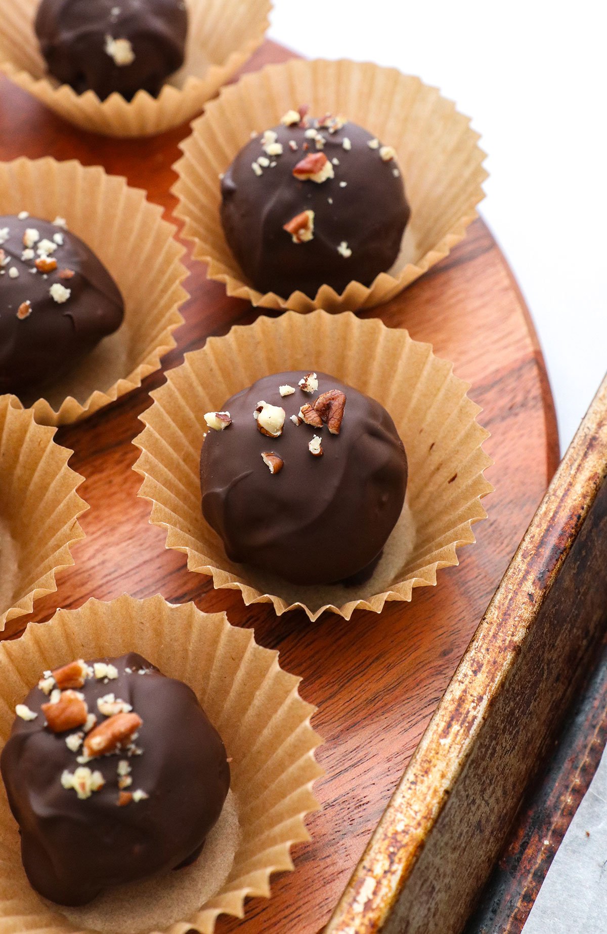 pecan pie truffles coated in chocolate. - 26