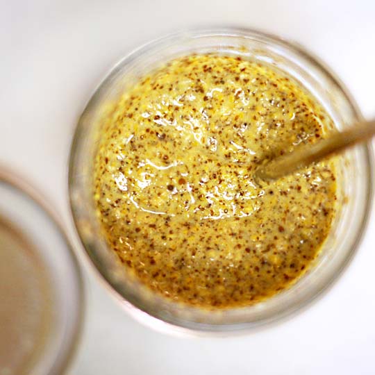 homemade spicy mustard in a glass container