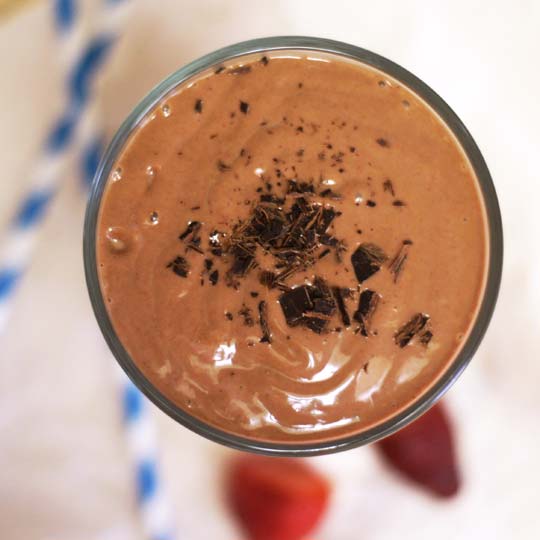 chocolate covered strawberry shake with chocolate shavings on top