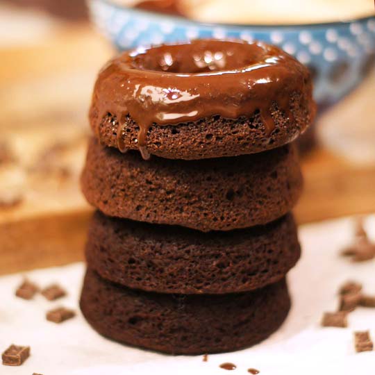 stacked glazed chocolate donuts