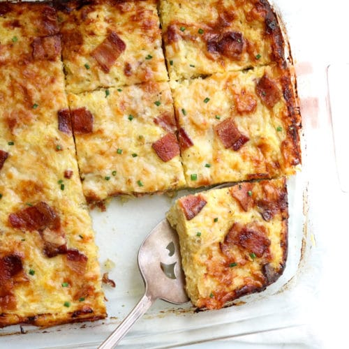 breakfast casserole sliced and served with spatula.