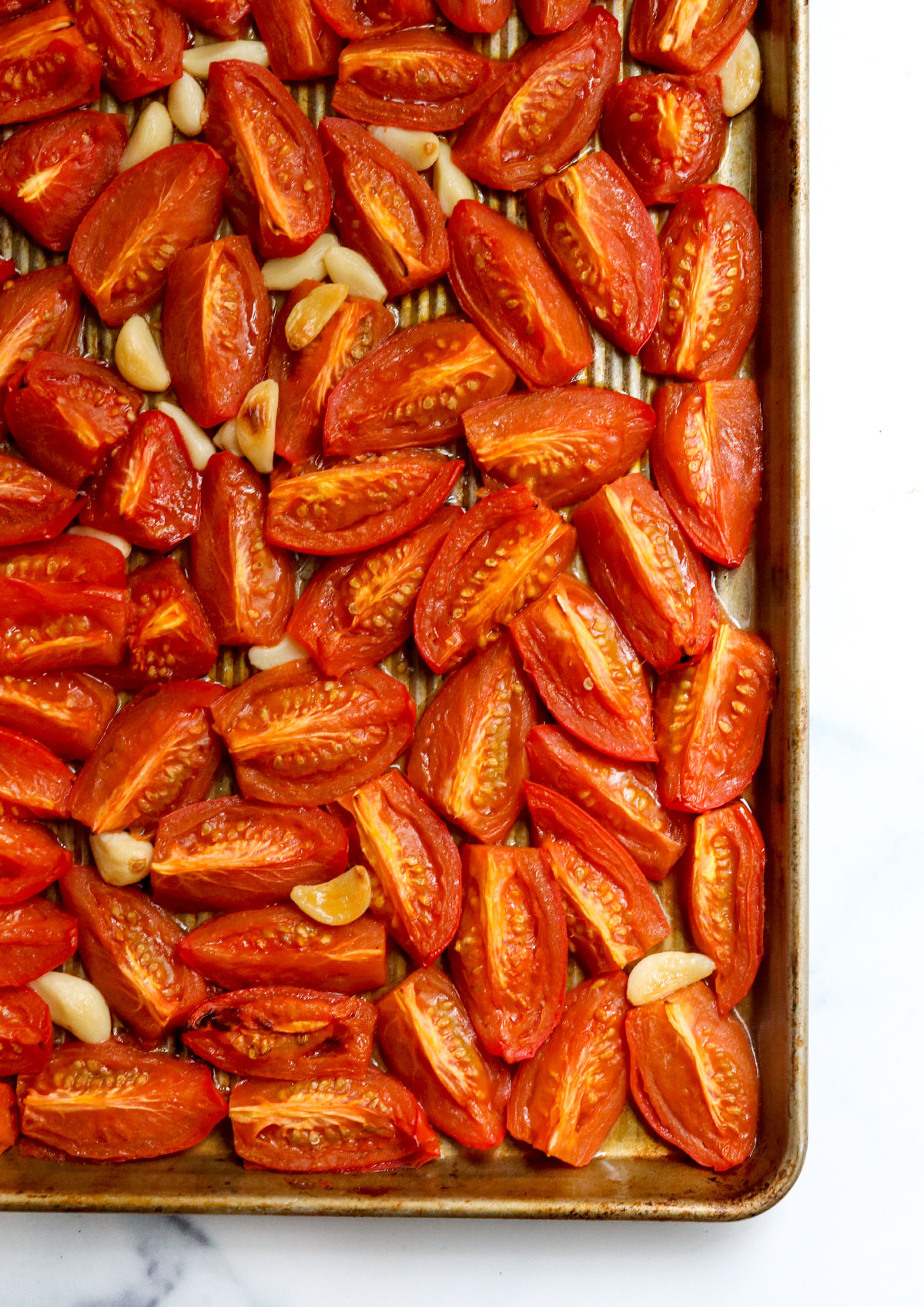 roasted tomatoes on sheet pan