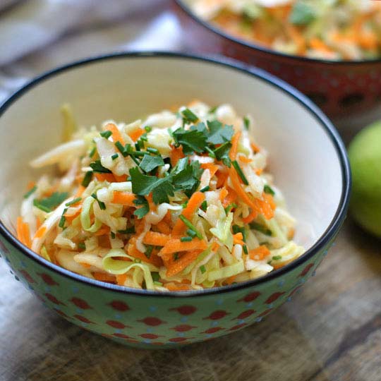 This SWEET SESAME-LIME CABBAGE SALAD, features fresh lime juice and a touch of sesame oil. This light refreshing salad is a new favorite in my home! #salad #healthyfood