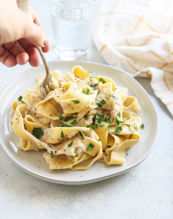 cauliflower alfredo pasta with fork