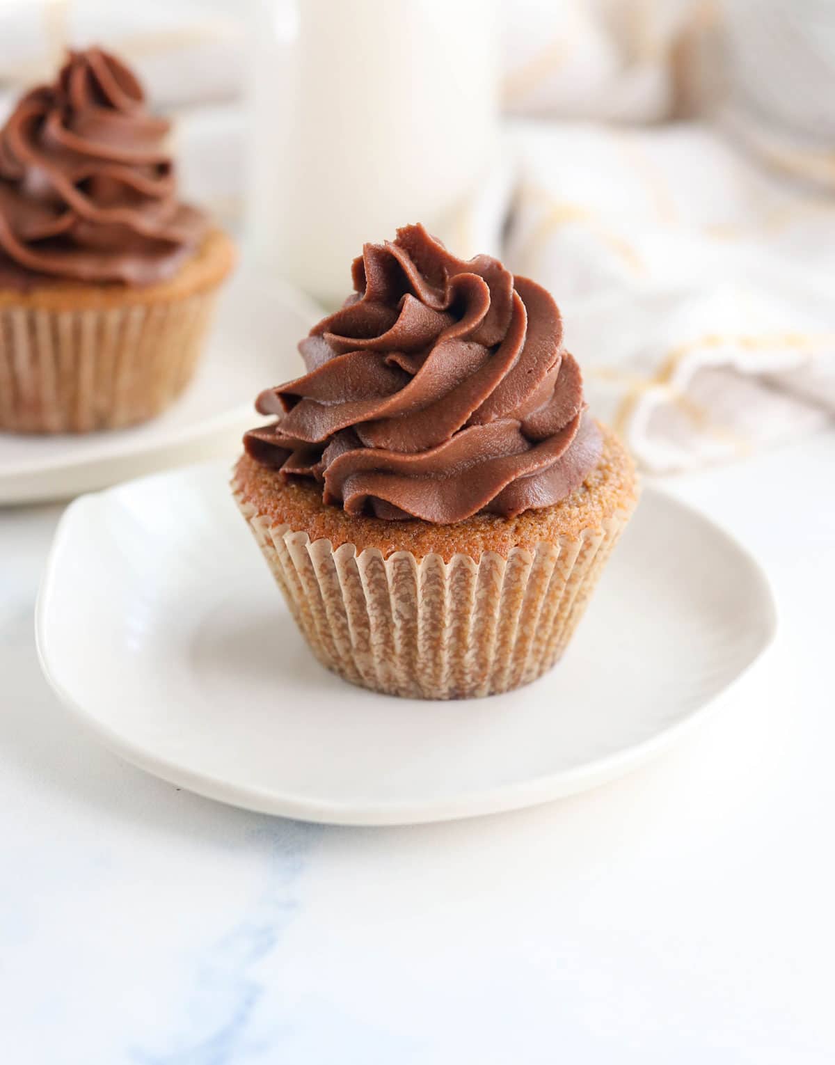 coconut flour cupcake with chocolate piped frosting