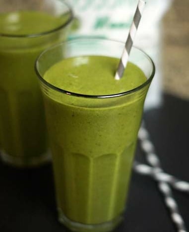 green lactation smoothie in a glass