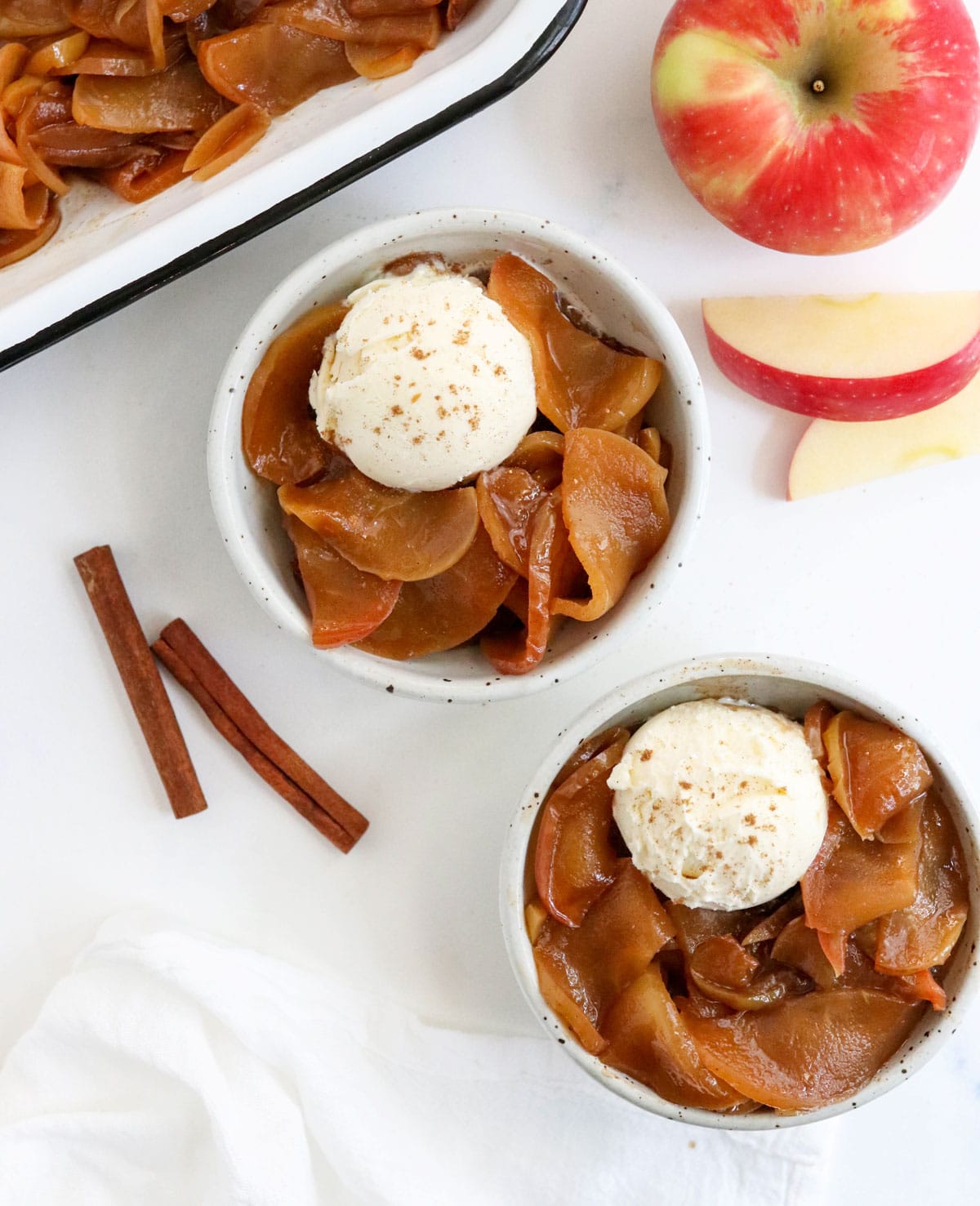 baked apples topped with vanilla ice cream