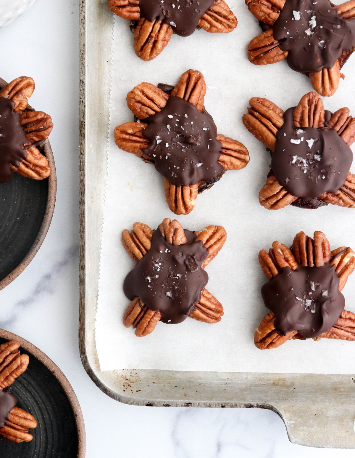 chocolate turtles on parchment paper