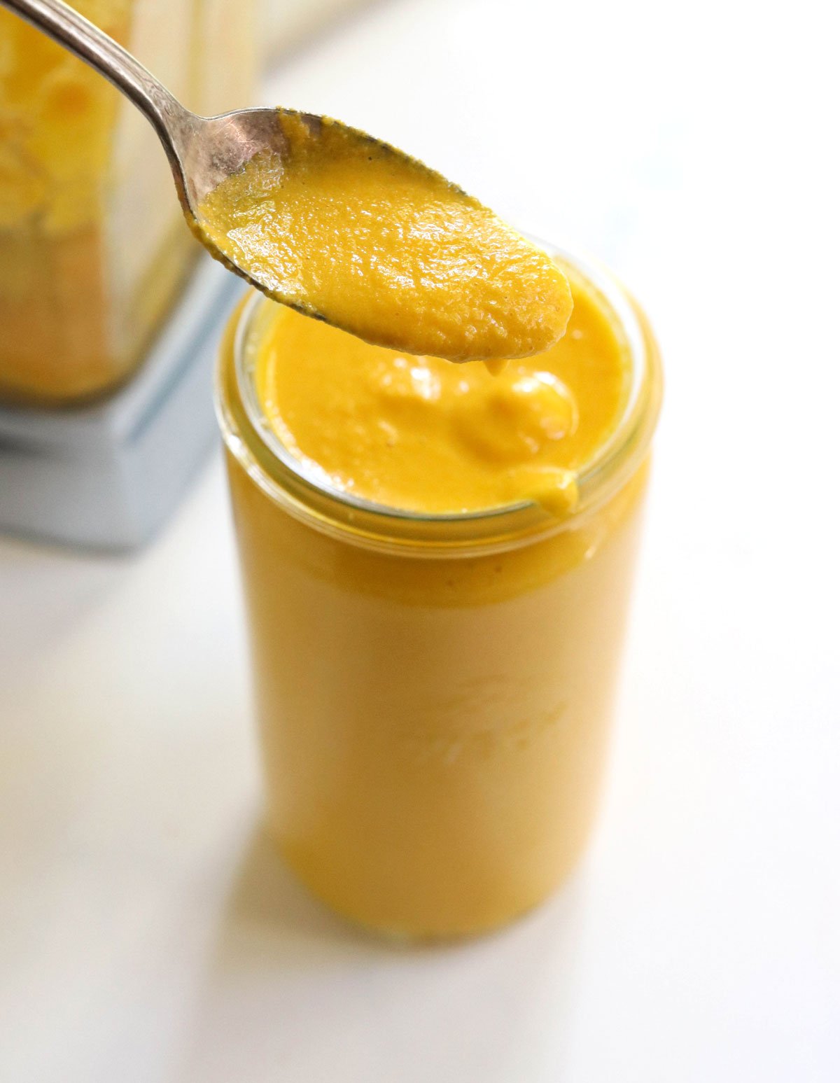 carrot ginger dressing on spoon