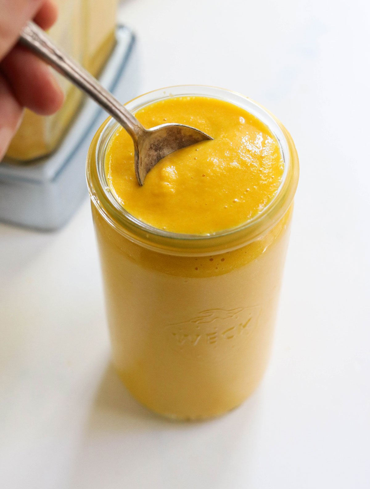 carrot ginger dressing in glass jar