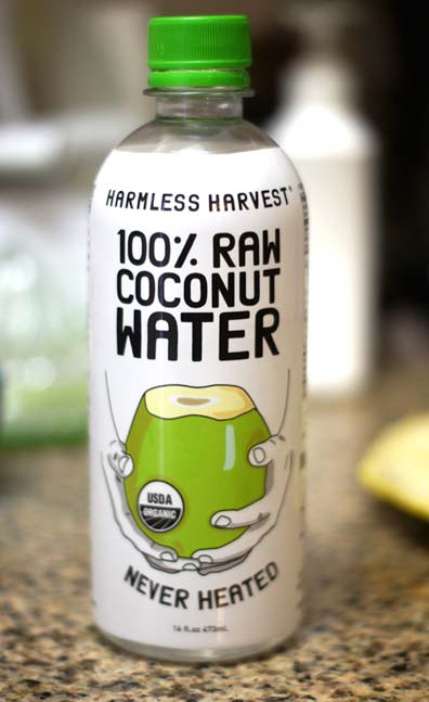 bottle of raw coconut water