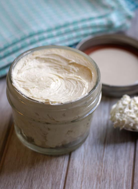 homemade lotion in a small glass container