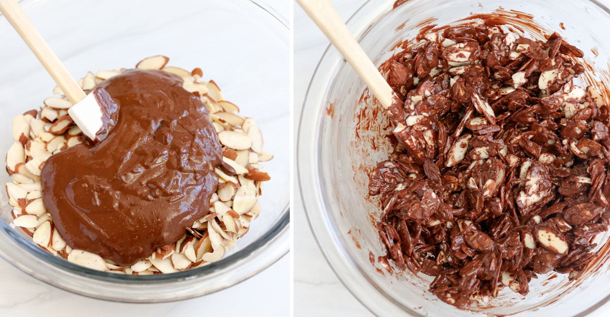 melted chocolate added to almonds in glass bowl