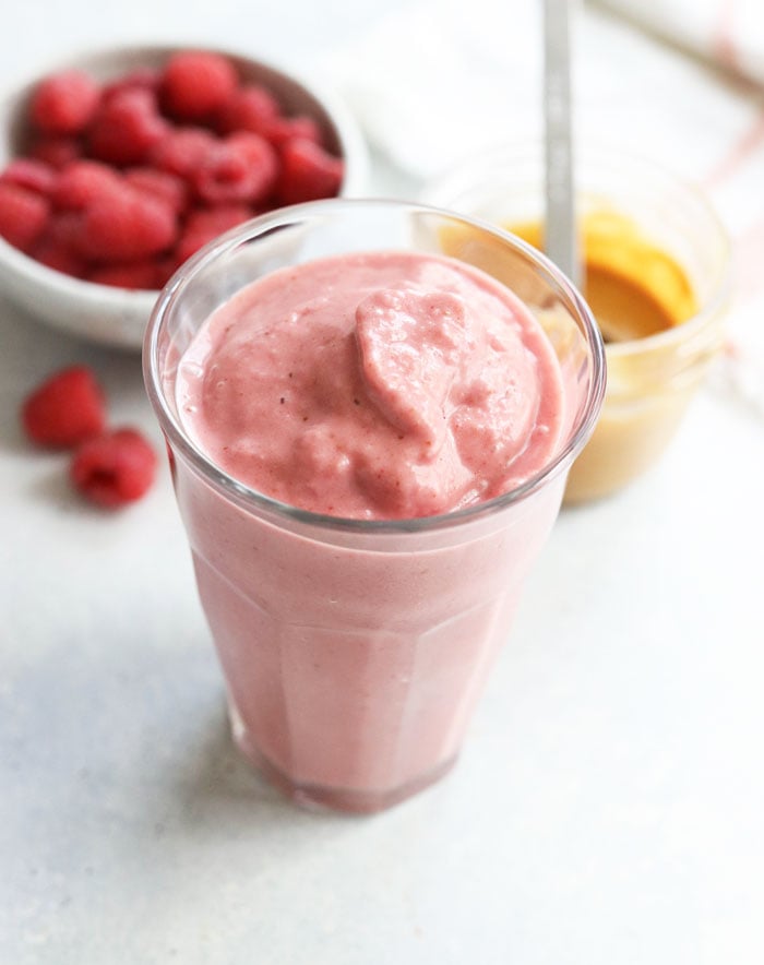 peanut butter jelly smoothie in glass