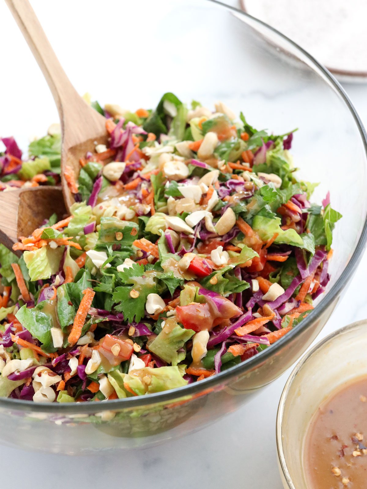 thai salad tossed in glass bowl