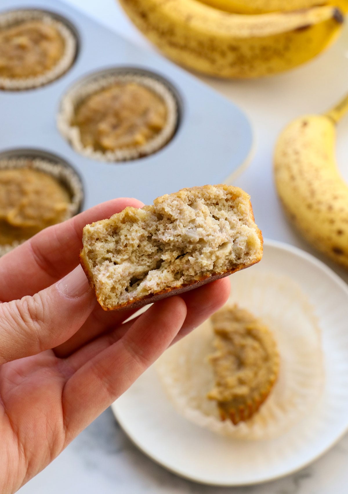 banana muffin for baby split in half to show texture.