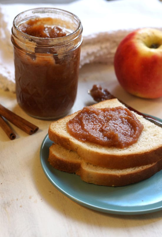 apple butter in a glass jar and spread on toast