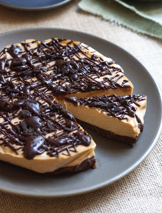 no-bake peanut butter cup pie on a plate with a slice cut out