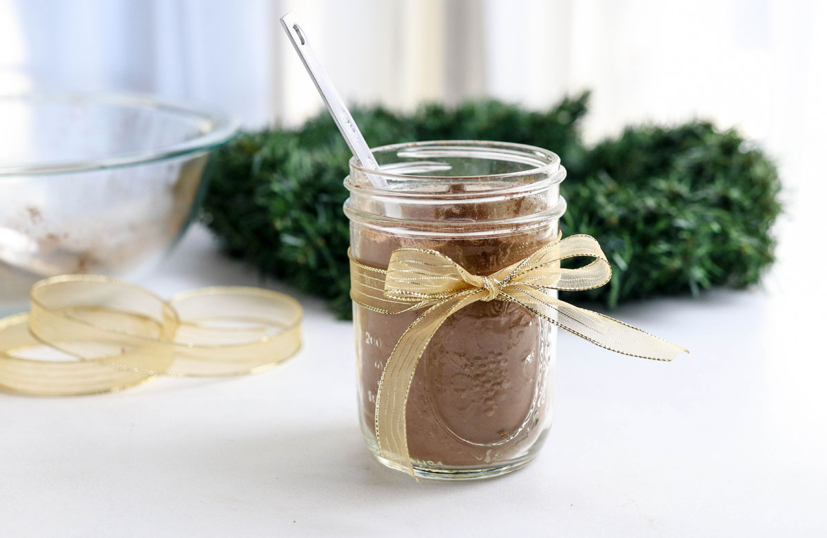 hot chocolate mix in a jar with a bow