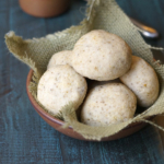 Paleo dinner rolls in small dish with burlap