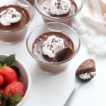 chocolate pots de creme on white surface