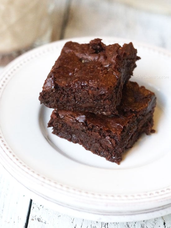 two chewy brownies on a plate
