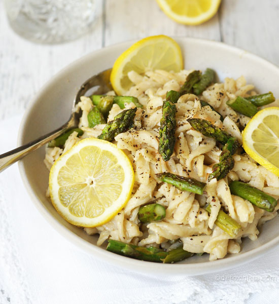 lemon asparagus pasta in bowl with fork