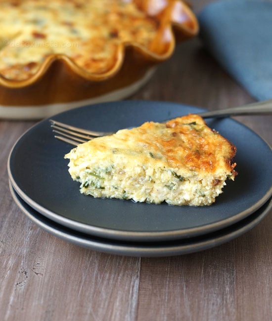 slice of crustless quiche on a plate with a fork