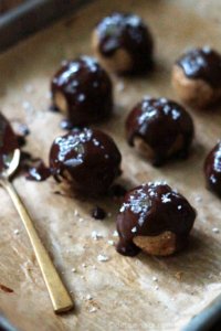 salted peanut butter truffles on parchment paper
