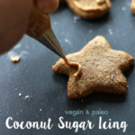coconut sugar icing being pipped on cookie