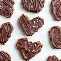 chocolate peanut butter hearts on parchment paper