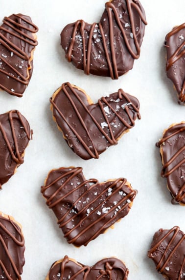 chocolate peanut butter hearts on parchment paper