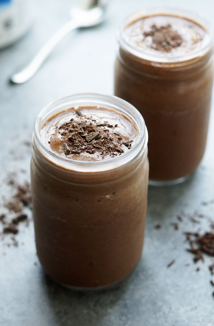 chocolate pea protein shake with chocolate shavings on top