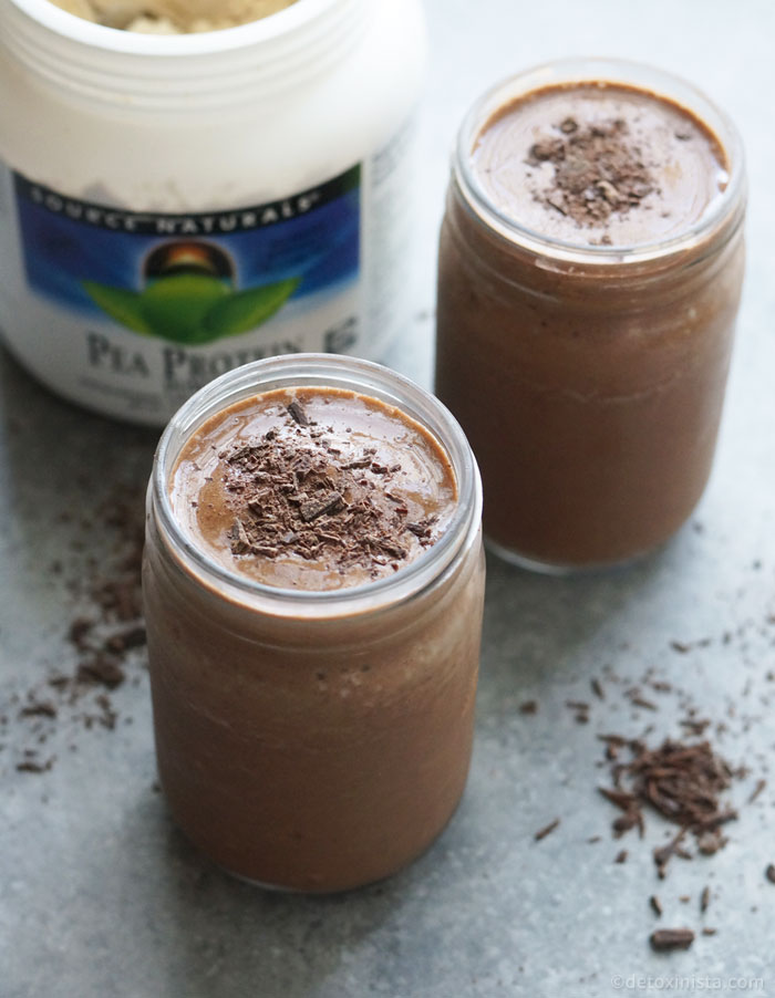 chocolate pea protein shakes with chocolate shavings on top